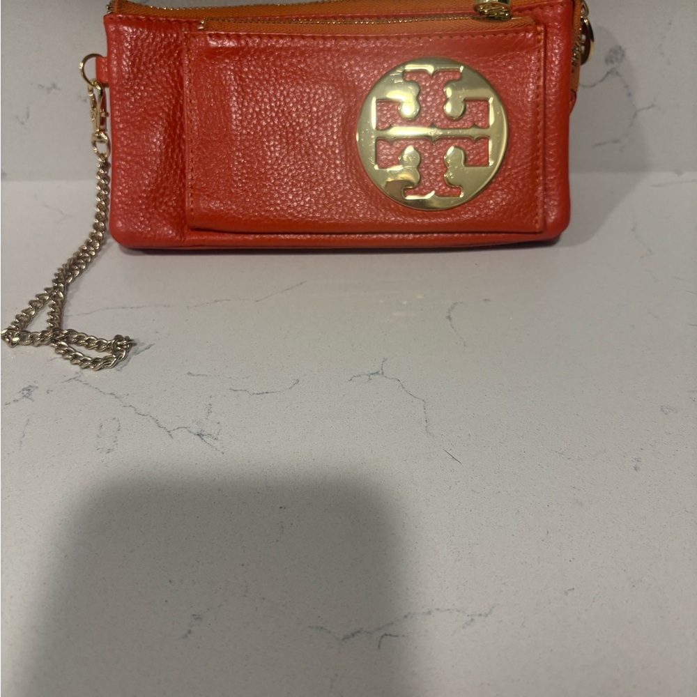 Tory Burch orange wristlet